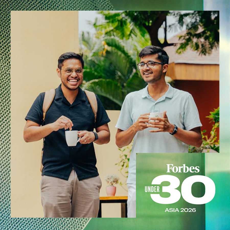 Ferra's two founders, Anurag and Rohit, sharing a laugh over cups of tea